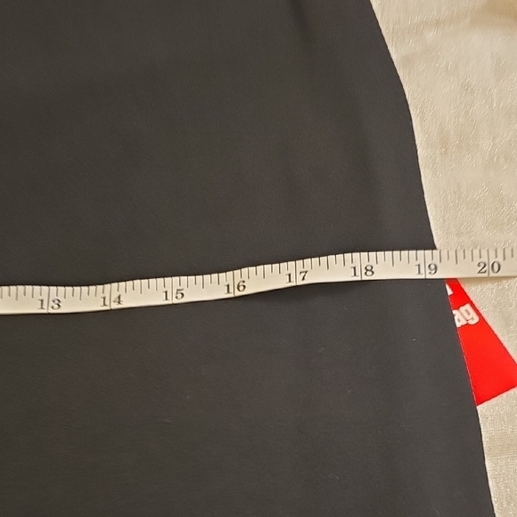 Tiana B. Elegant Black Dress with Embellished Cuffs - Picture 10 of 15